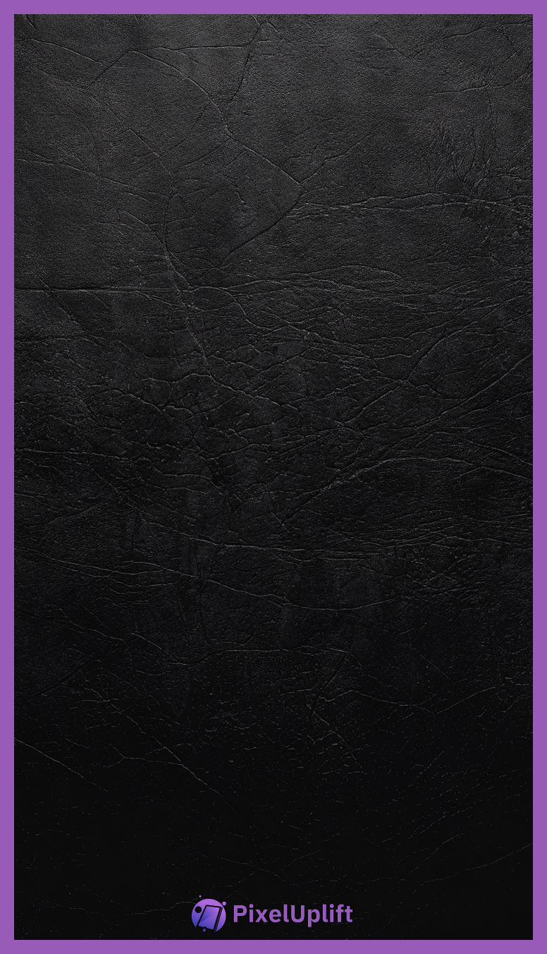 Close-up of textured black leather surface phone wallpaper lockscreen