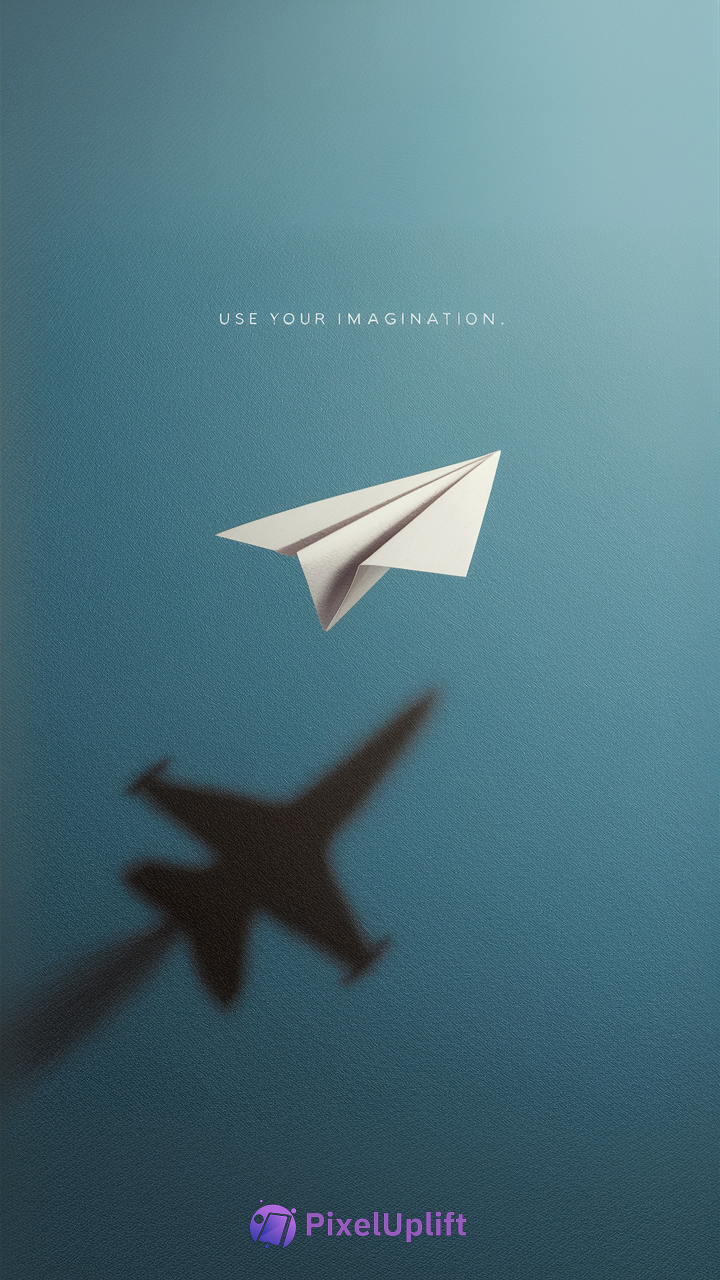 White paper airplane flying against a blue sky with text saying Use Your Imagination and shadow resembling a jet fighter plane
